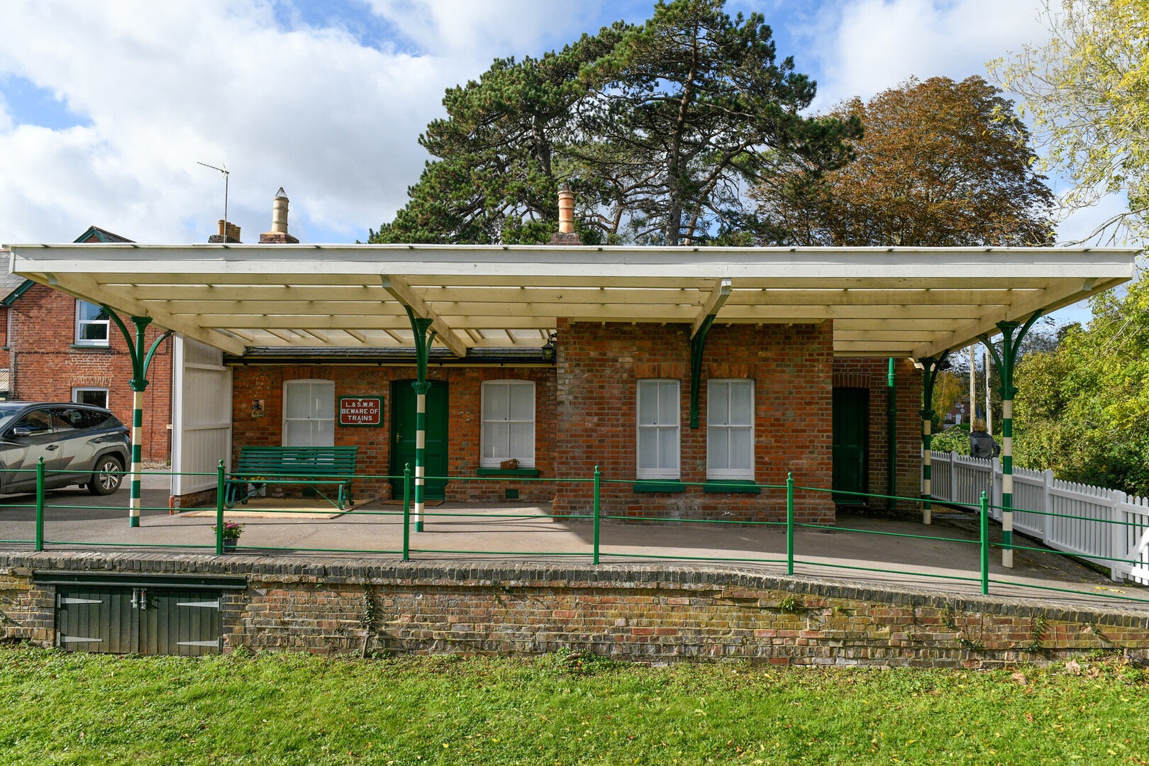 a brick building with a canopy
