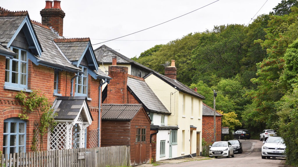 a row of houses in a village setting