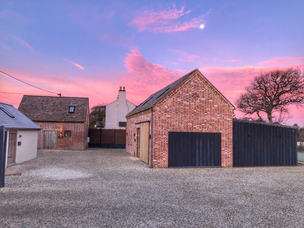 Refurbished agricultural buildings at sunset