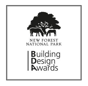 New Forest National Park Building Design Awards logo with a tree and two grazing ponies above the text