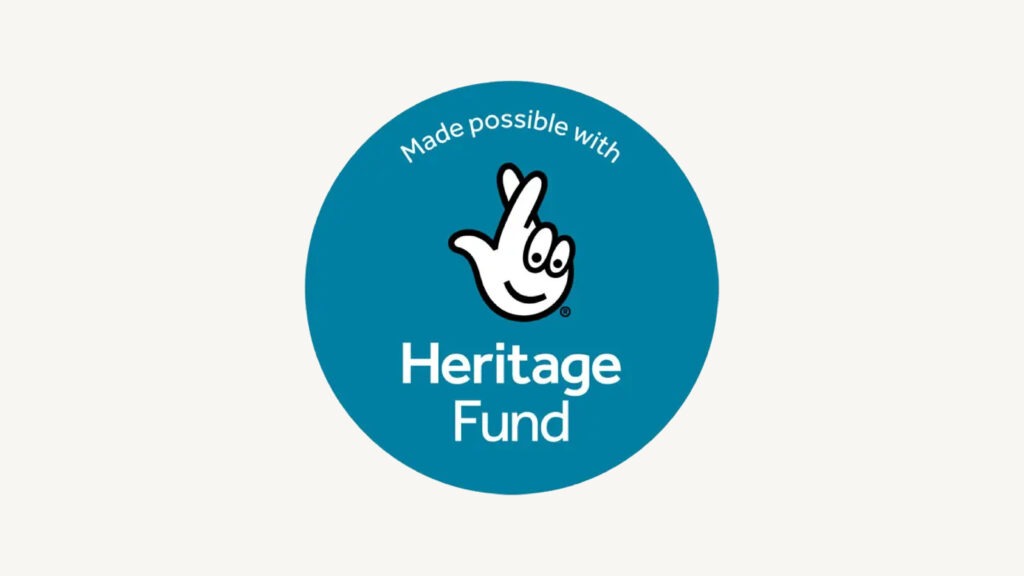 Heritage Fund logo with crossed-fingers hand icon and the words Made possible with Heritage Fund