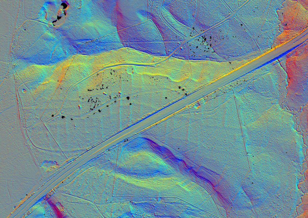 LiDAR aerial map showing Roman field system boundaries and trackways at Slufters and Bratley Inclosures, cut by a modern road