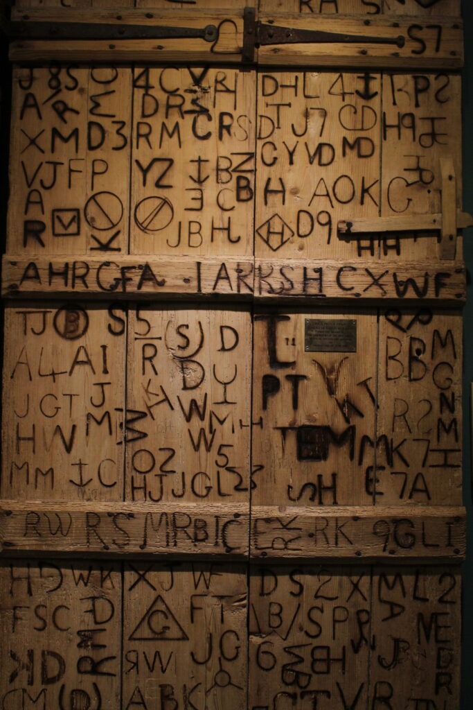 Commoner's brands burned into wood.