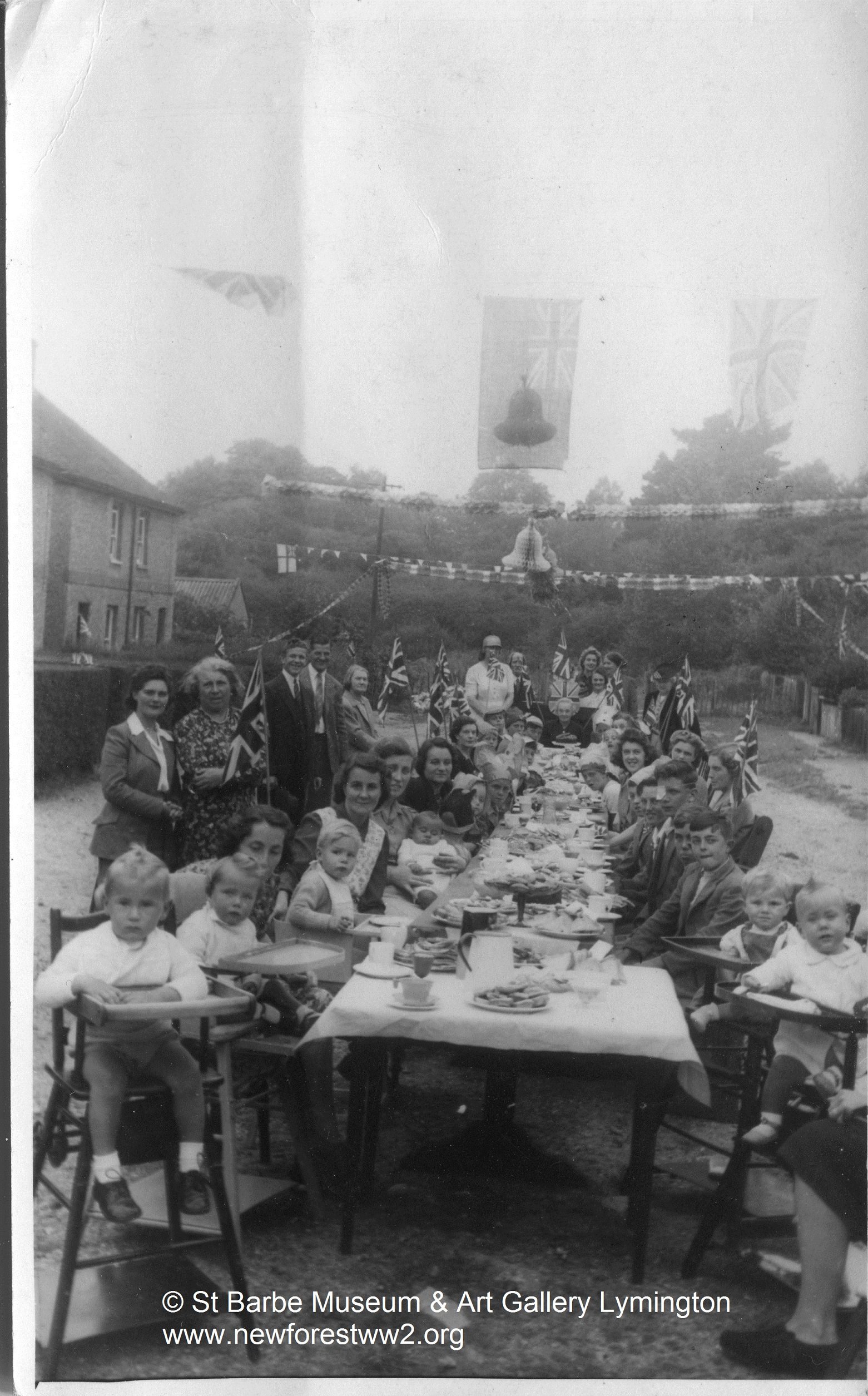 Residents of May Avenue celebrating VE day, Lymington. 18 August 1945